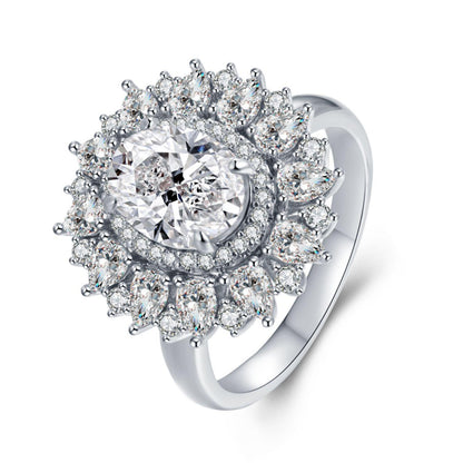 The Diamond Jubilee Glory | Oval Halo Cluster Ring